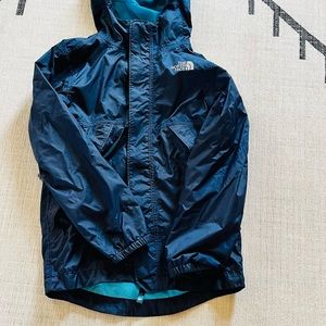 Boys, two piece North Face navy windbreaker plus grey fleece jacket.